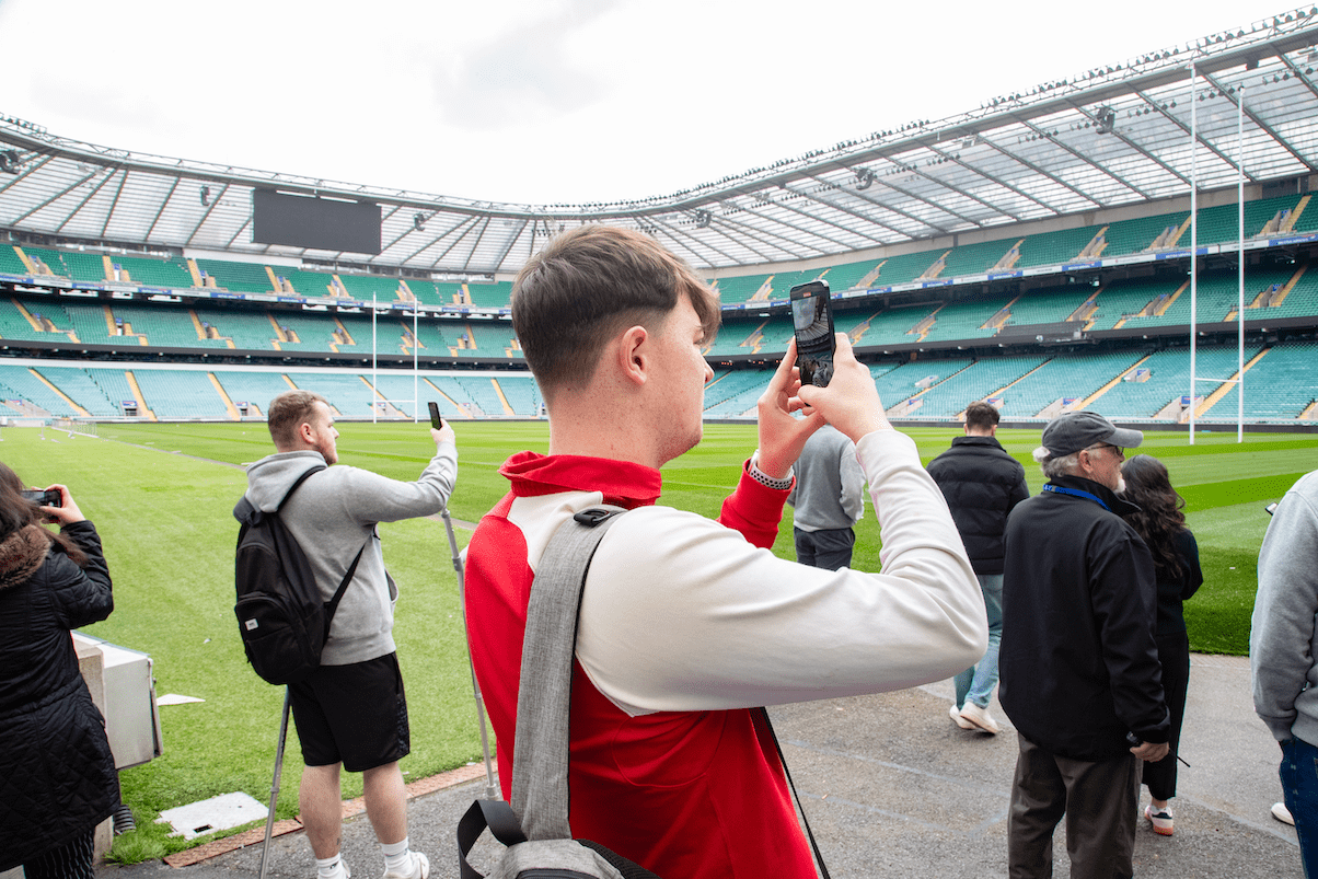 Student taking photo at Twickenham stadium